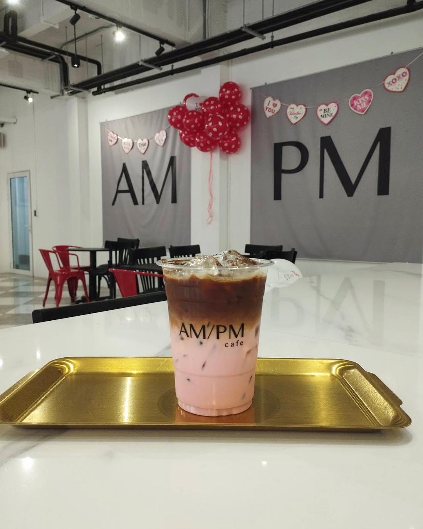 Pink drink inside AmPm Ari Cafe