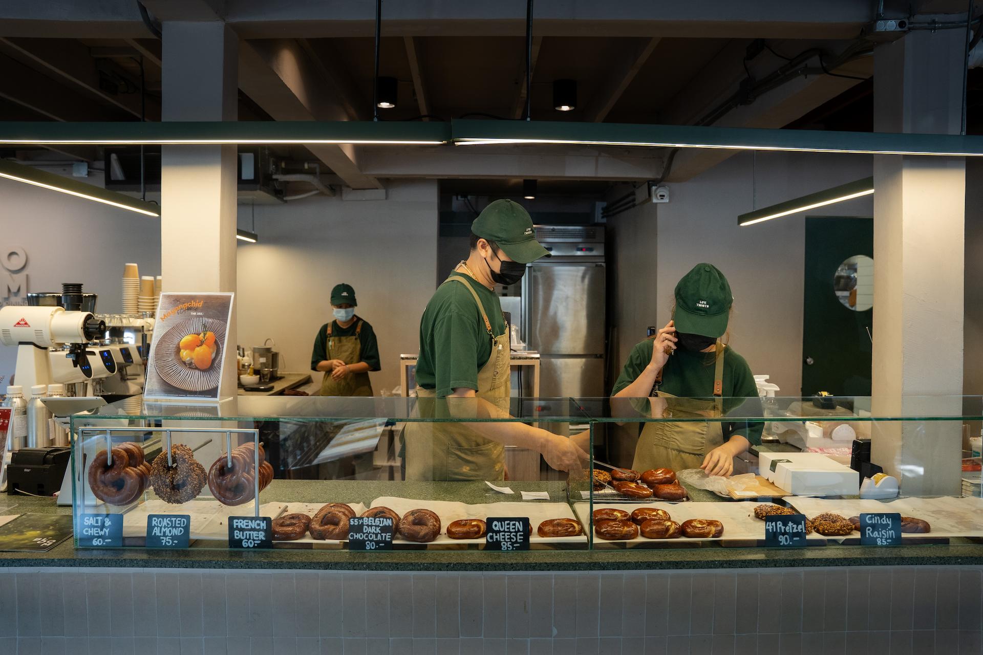 Bloom Dining staff serving soft pretzels