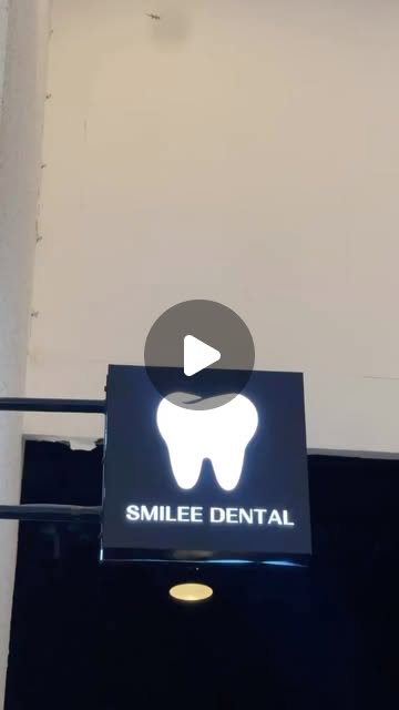 Smilee Dental signage at night